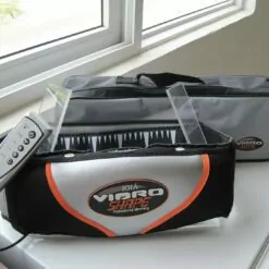 đai massage vibro shape chụp ở phòng khách